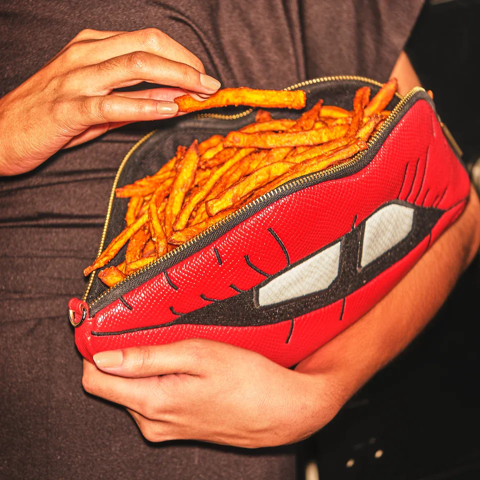 Red Robin fries arranged inside a playful lips-shaped clutch