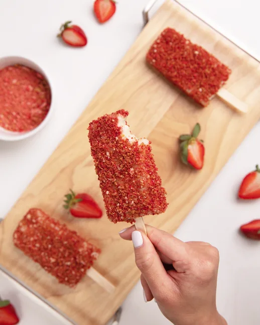 Top-down strawberry bar popsicle styled for Orgain