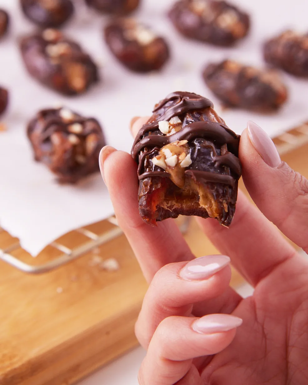 Chocolate-drizzled date treat made with Orgain protein powder